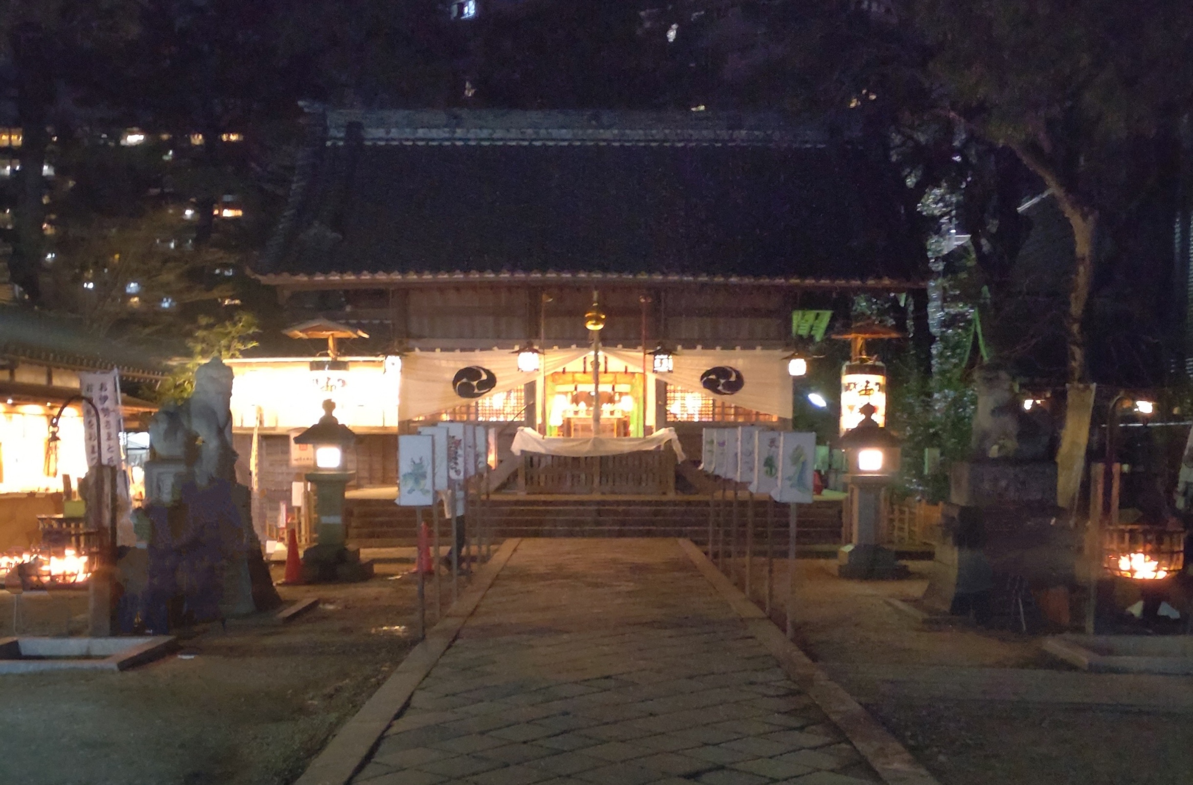 Dandadan Season 2 inspired featured image showing a traditional Japanese shrine at night, with a mystical and eerie atmosphere, symbolizing the anime's supernatural themes.